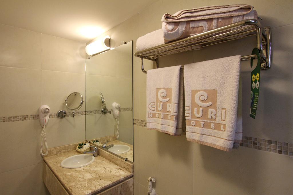 Hotel Curi Executive Pelotas Zimmer foto