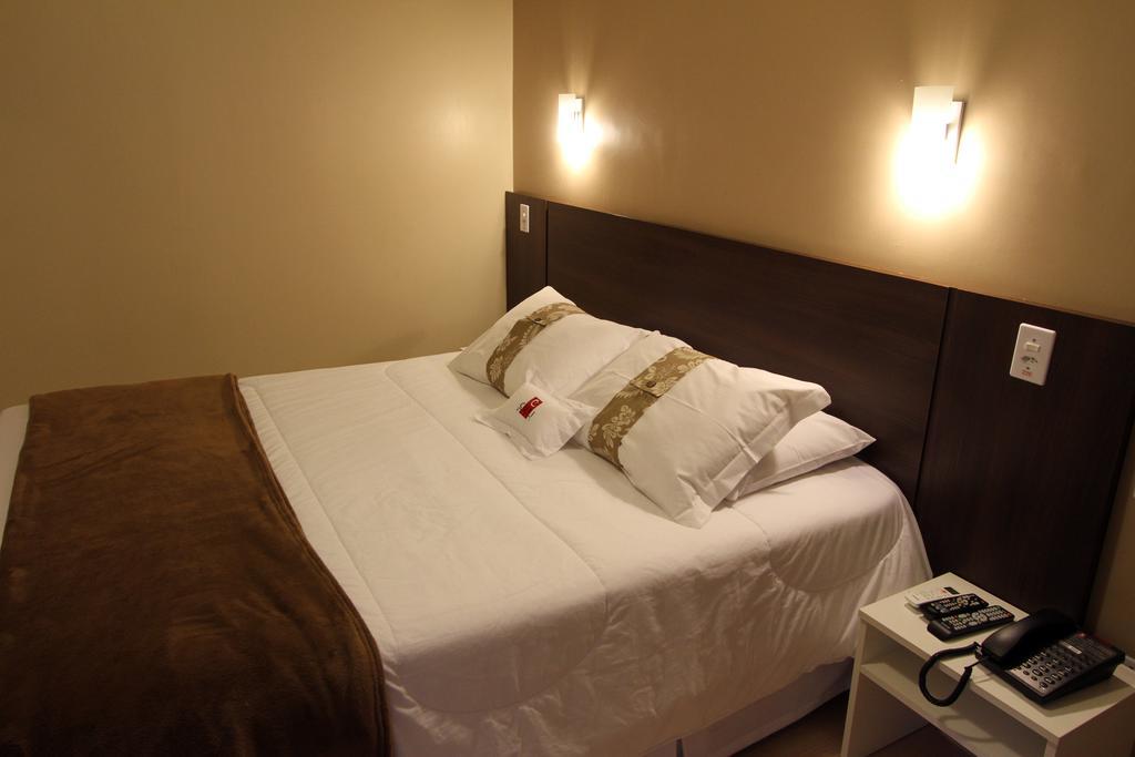 Hotel Curi Executive Pelotas Zimmer foto